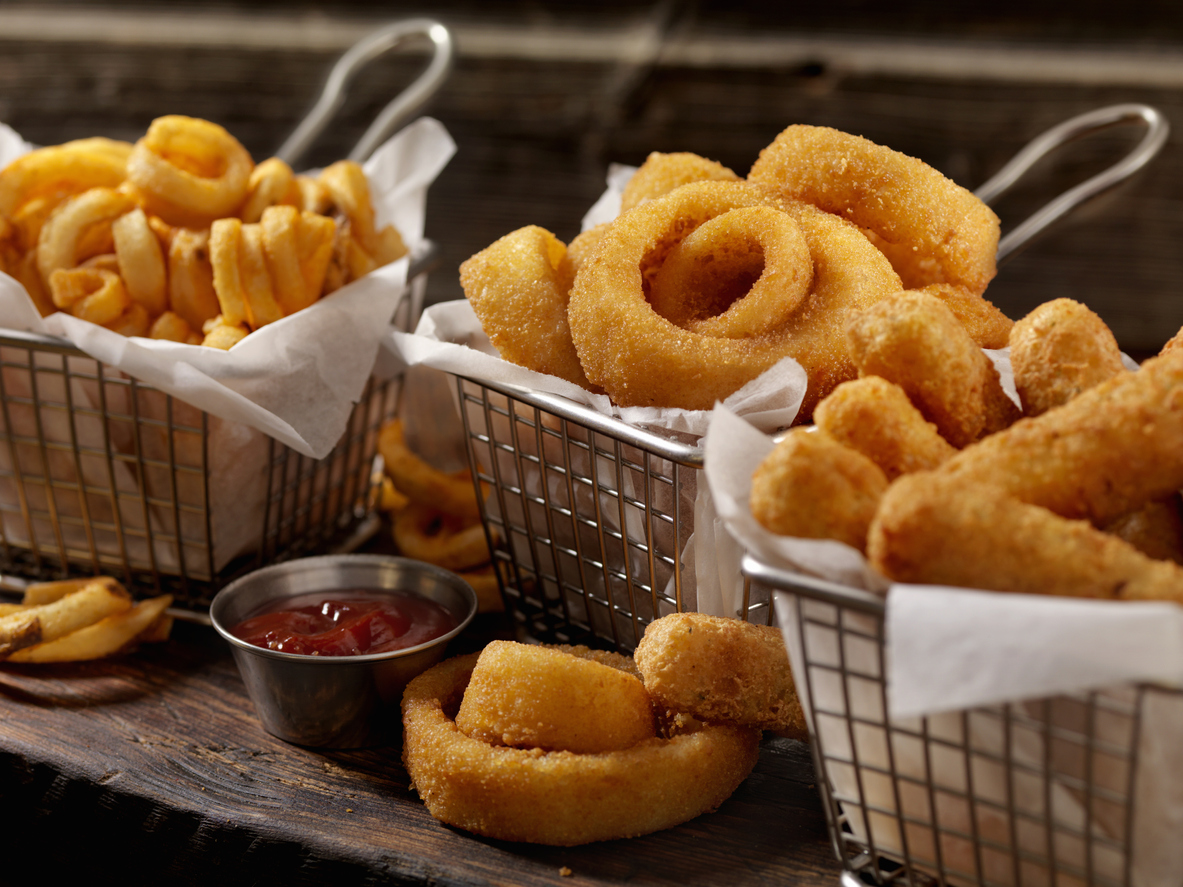 baskets-of-onion-rings-curly-fries-and-cheese-sticks